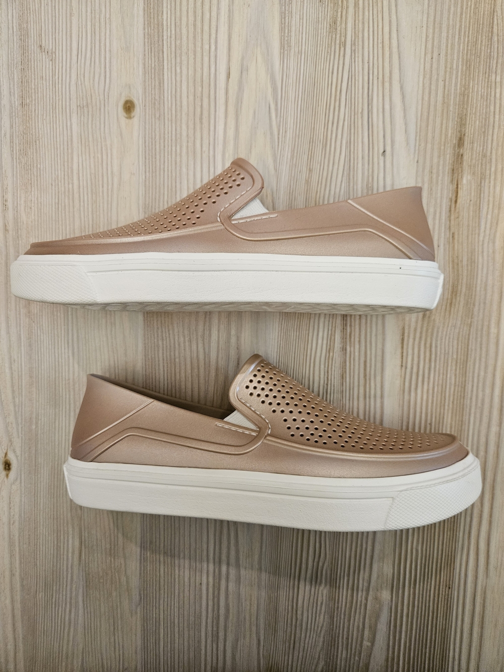 CROCS Women’s Slip-On Perforated Sneaker in Rose Gold and White